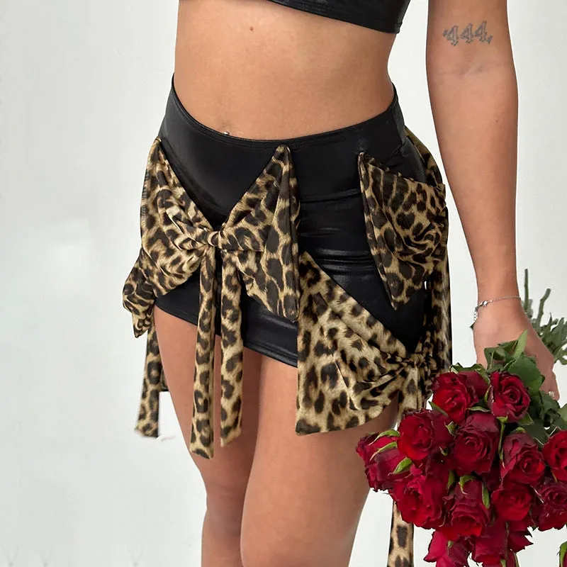 Fierce Leopard-Print Bow-Accent Mini Skirt with Sleek Silhouette